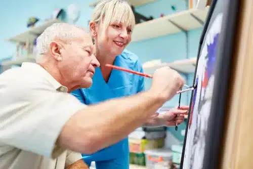 Man practicing art therapy.