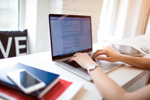 Women working as a freelancer after completing the creative writing course.